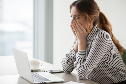 Surprised Woman viewing her account online